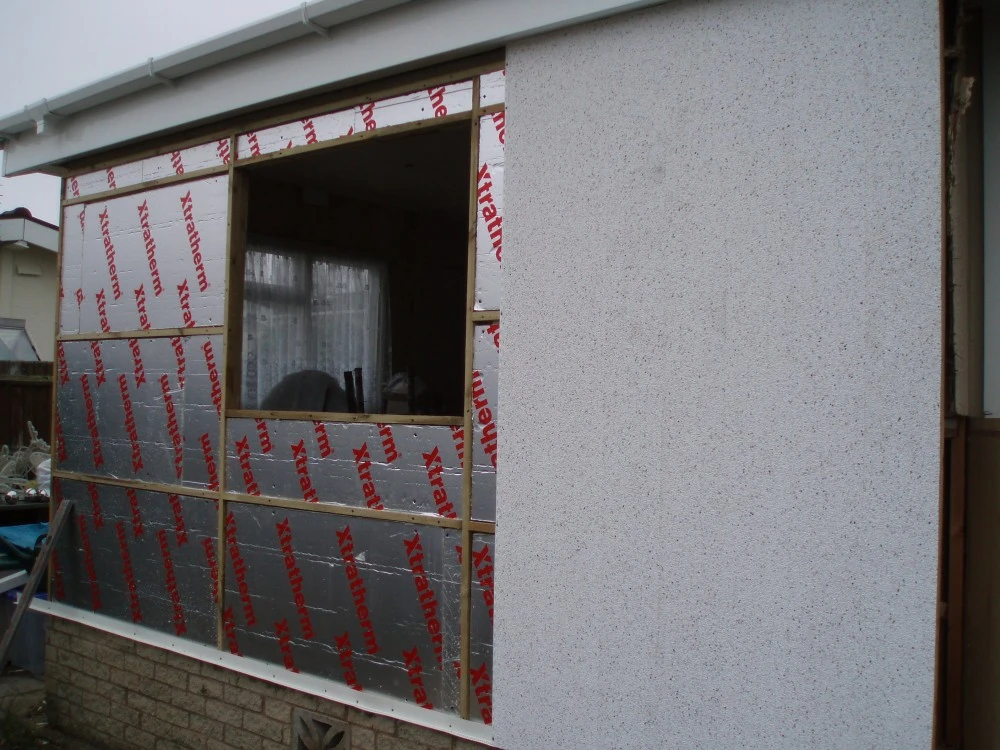Clad Walls Using Vinytherm PVCu Stonechip Cladding