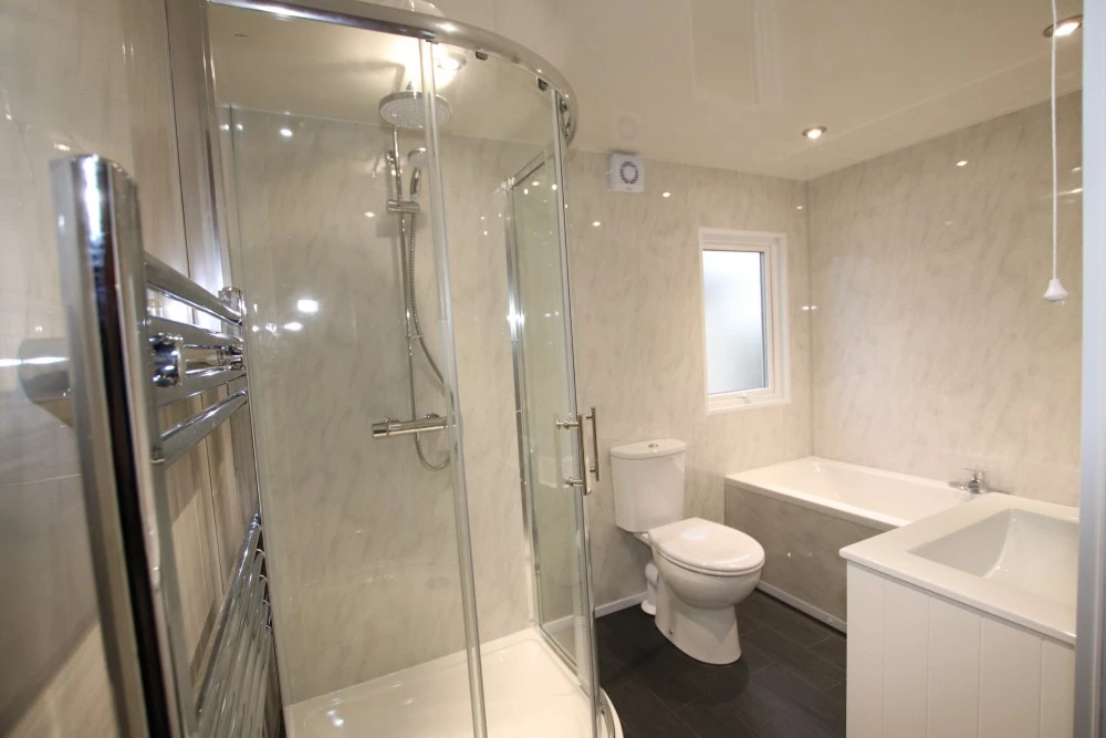 The Completed Enlarged Double Bathroom With A Bath & Shower